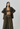 Elegant midi olive green skirt, women's sophisticated midi skirt, stylish olive green pencil skirt, formal midi skirt for women, fashionable midi length skirt, versatile olive green skirt, chic elegant midi skirt, evening midi skirt for women, office wear olive green skirt, timeless midi skirt style, women's tailored midi skirt, classy olive green fashion skirt, perfect midi skirt for special occasions